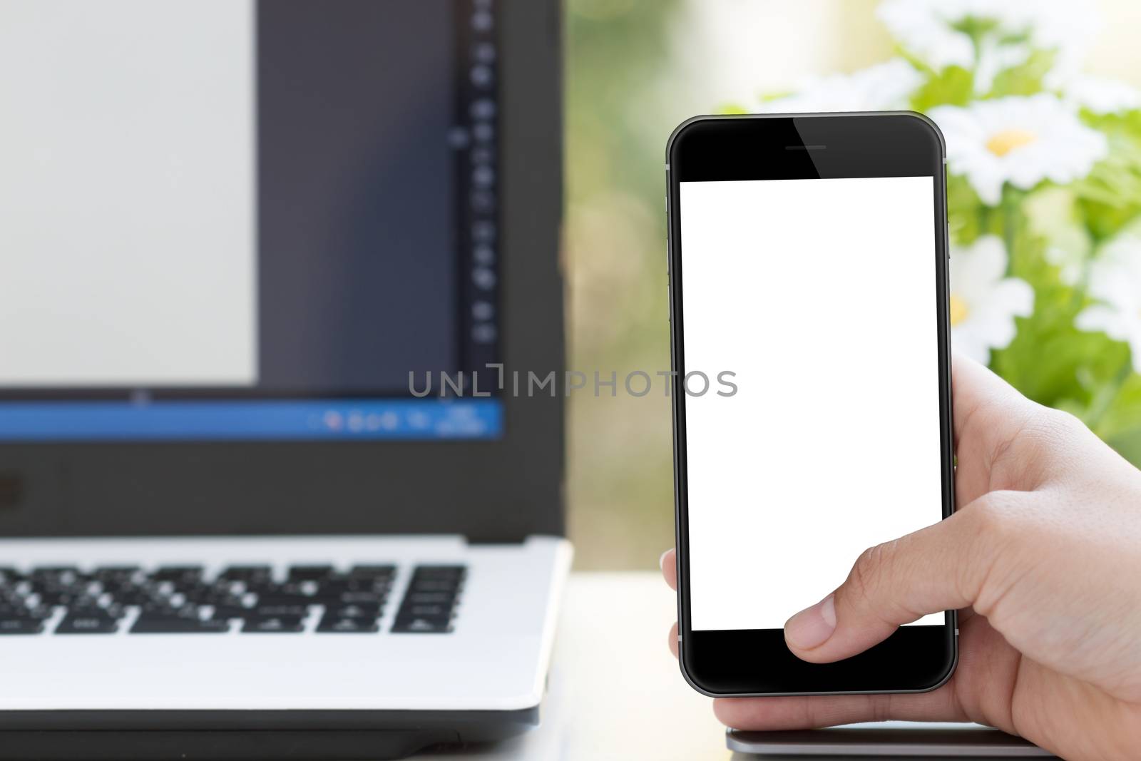 mockup phone in woman hand on desk by blackzheep