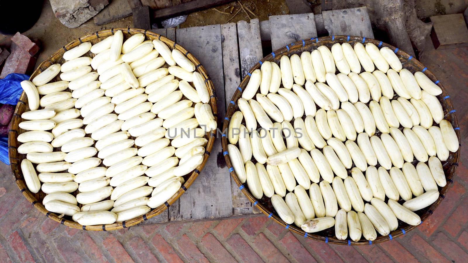 peeled banana in the baskets at fresh local market  in Luang Prabang, Laos