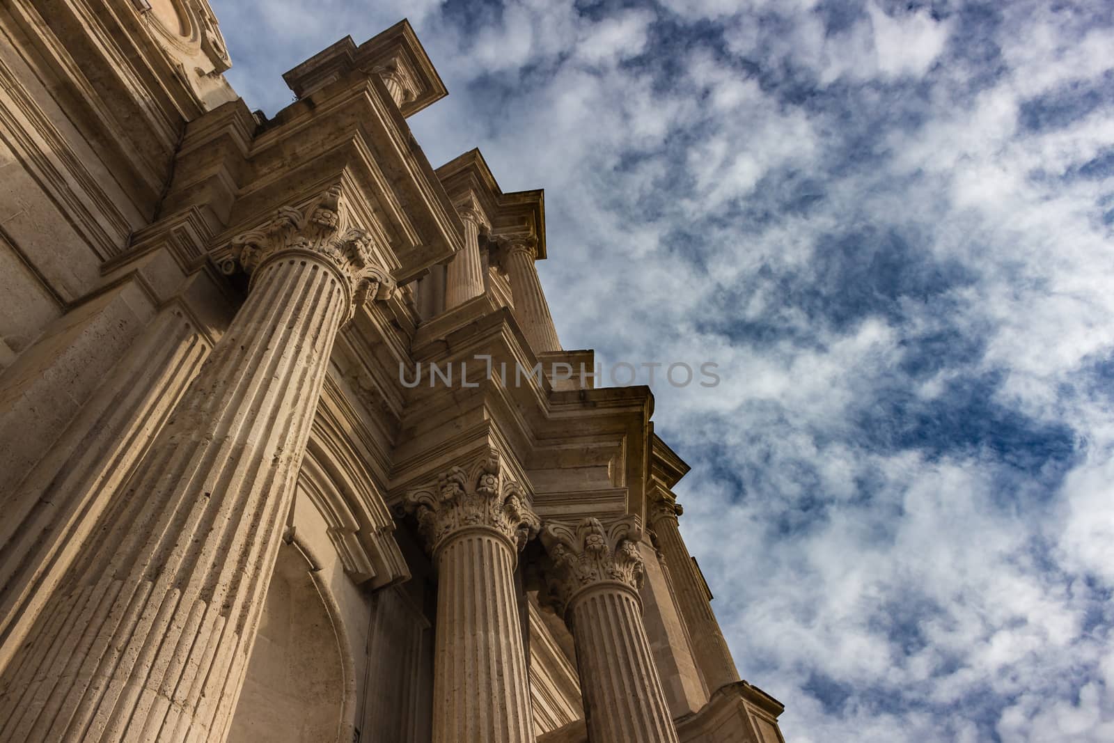 Detail of a italian baroque church on blue sky