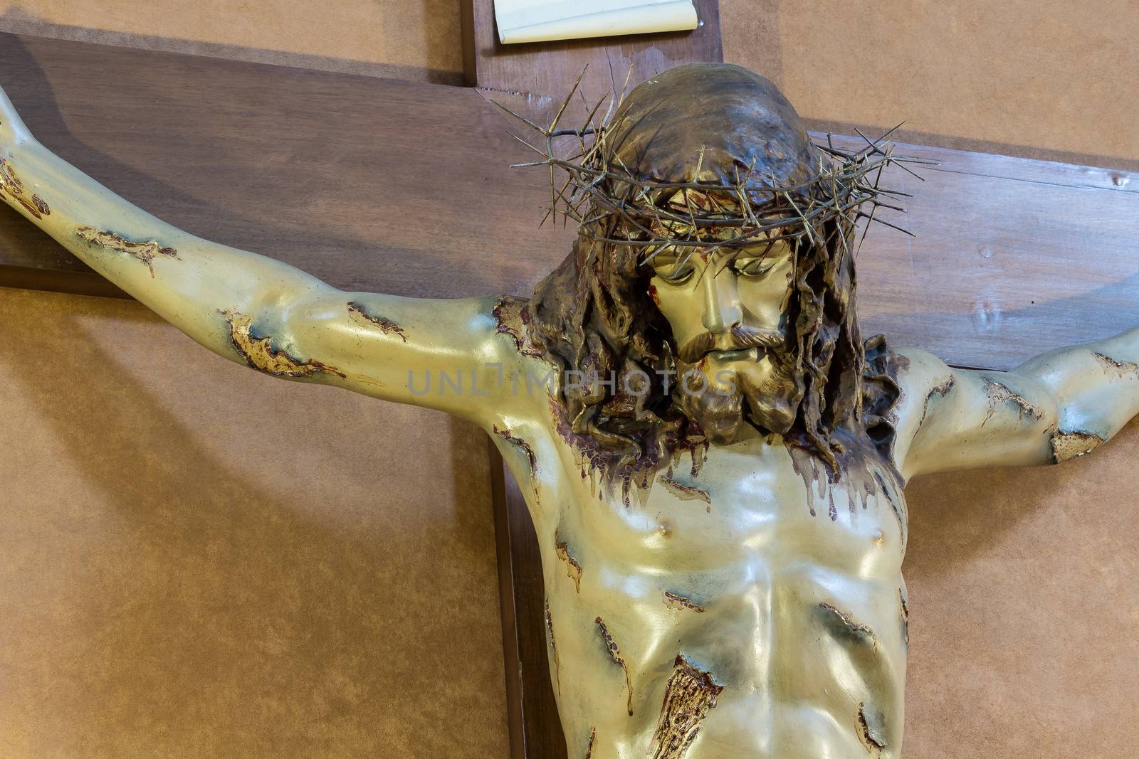 Detail of Christ on the cross in a old church of Sicily