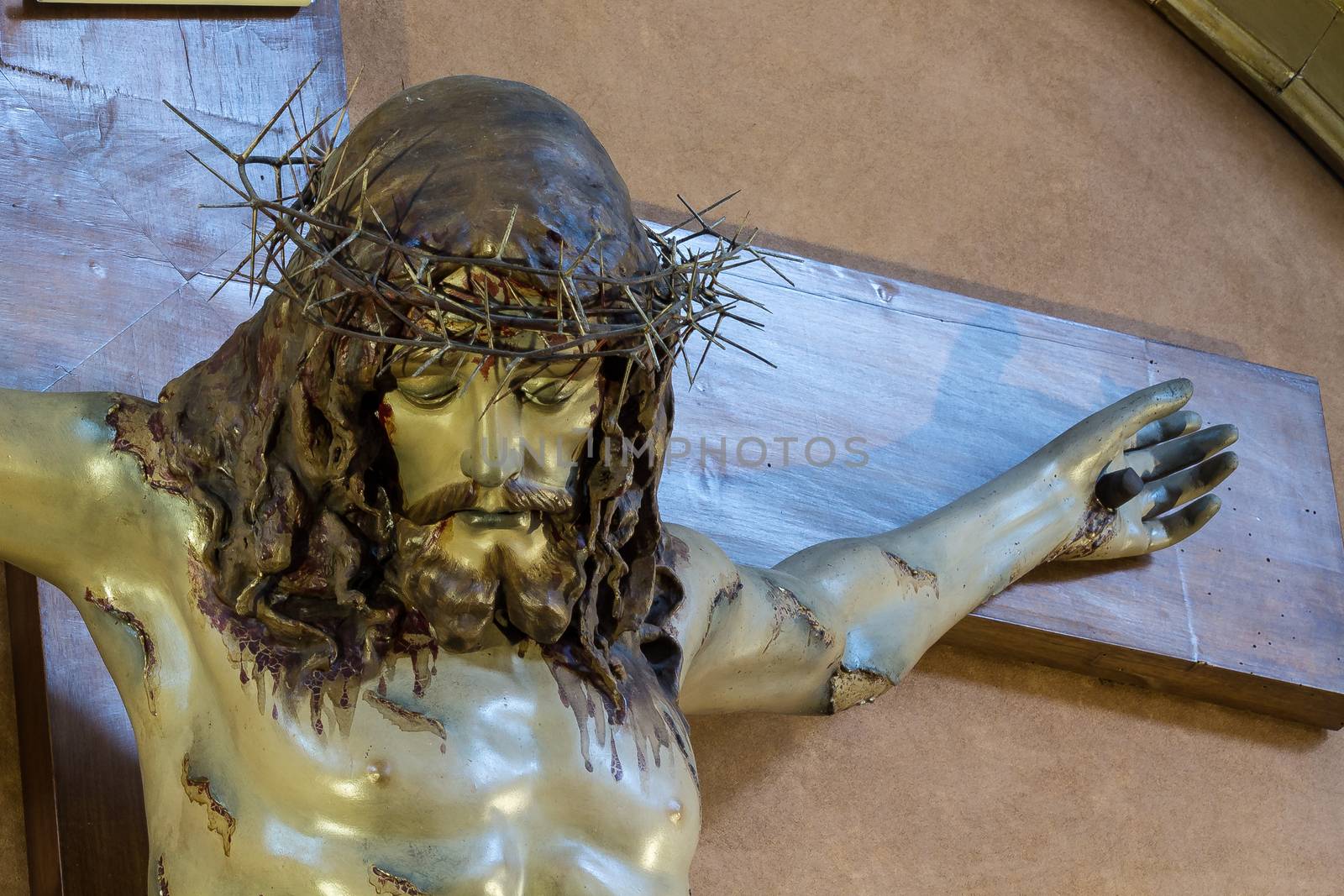 Detail of Christ on the cross in a old church of Sicily