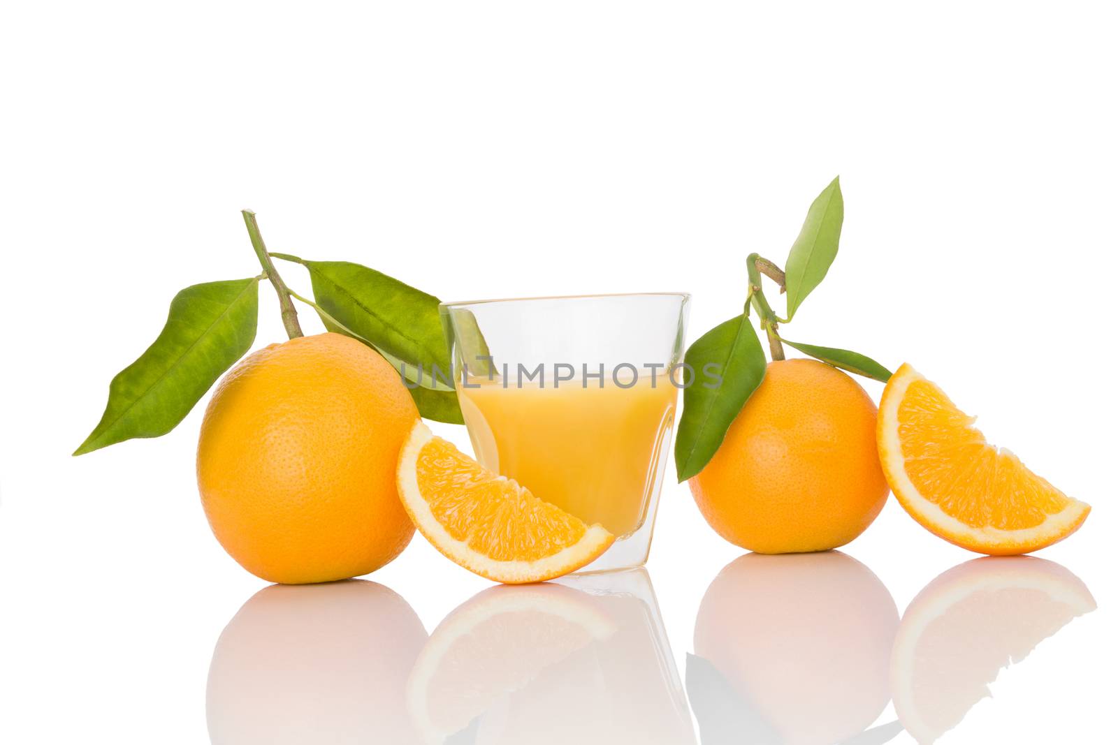 Delicious oranges isolated on white. by eskymaks
