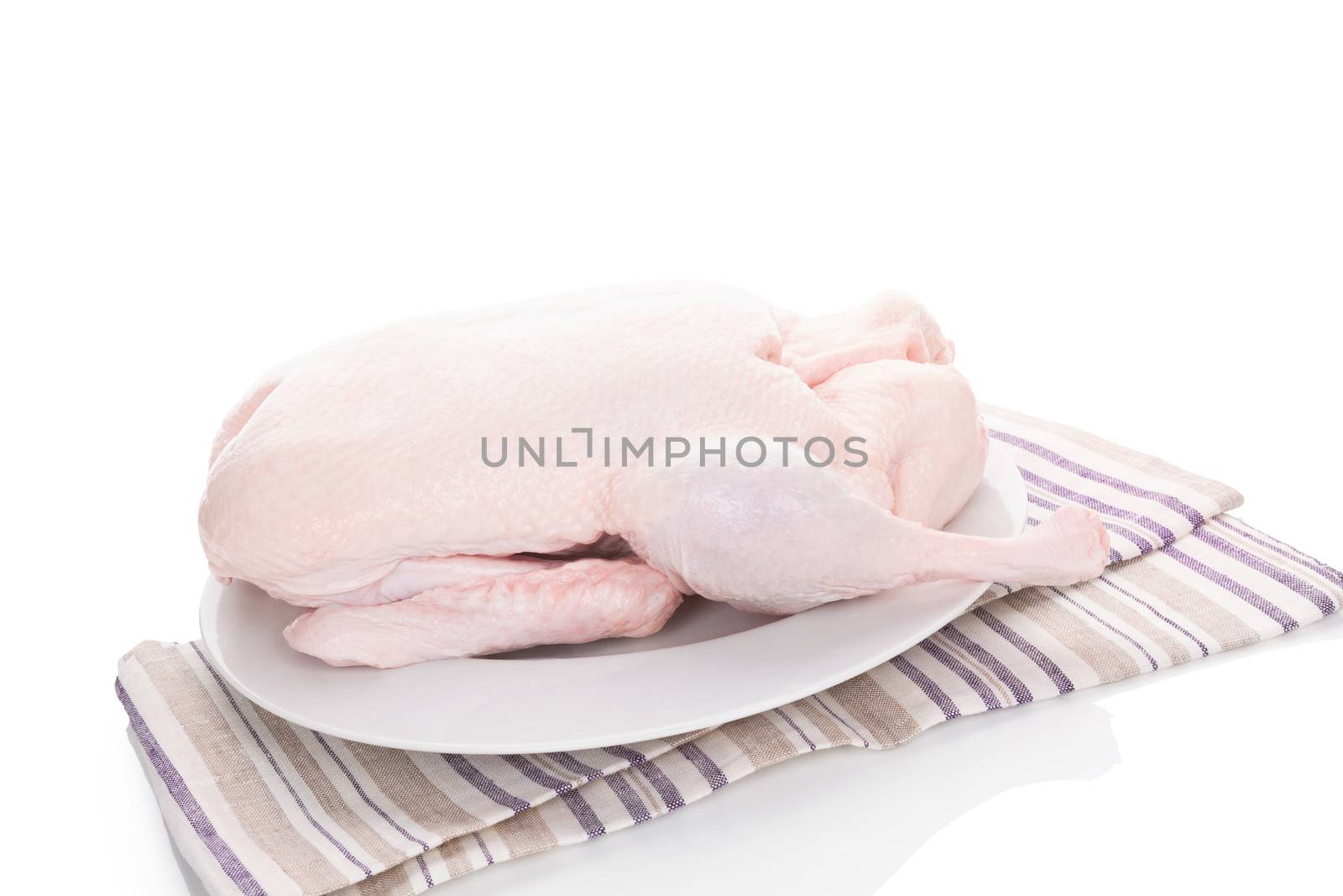 Fresh raw duck isolated on white. by eskymaks