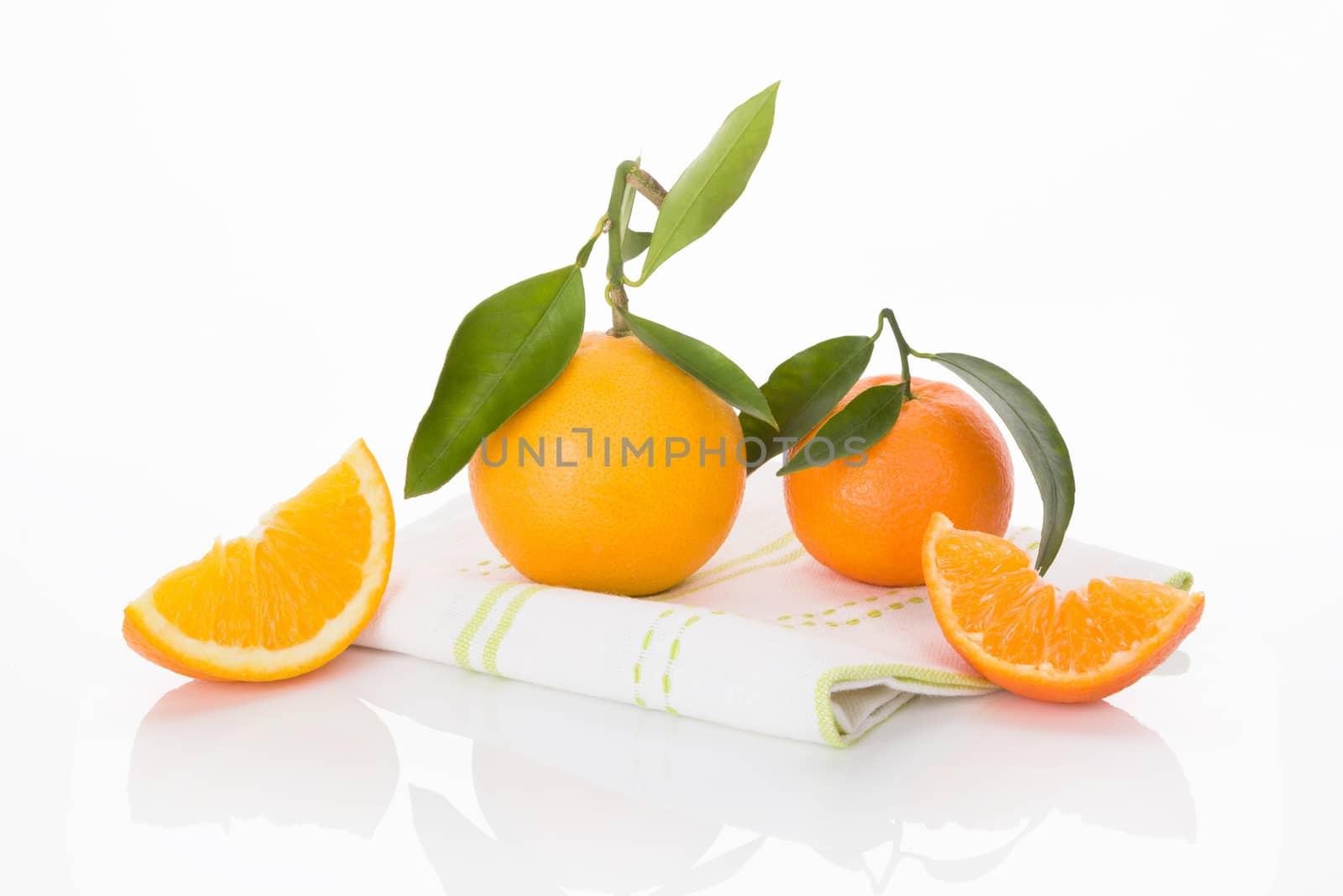 Delicious oranges isolated on white. by eskymaks