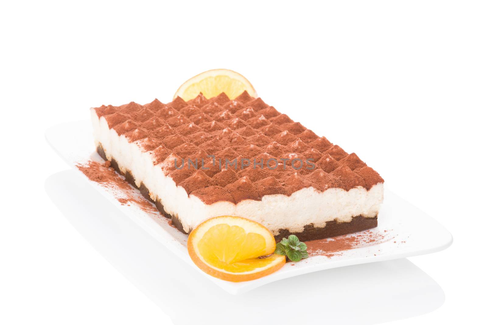 Delicious tiramisu dessert isolated on white background. Culinary traditional sweet dessert.
