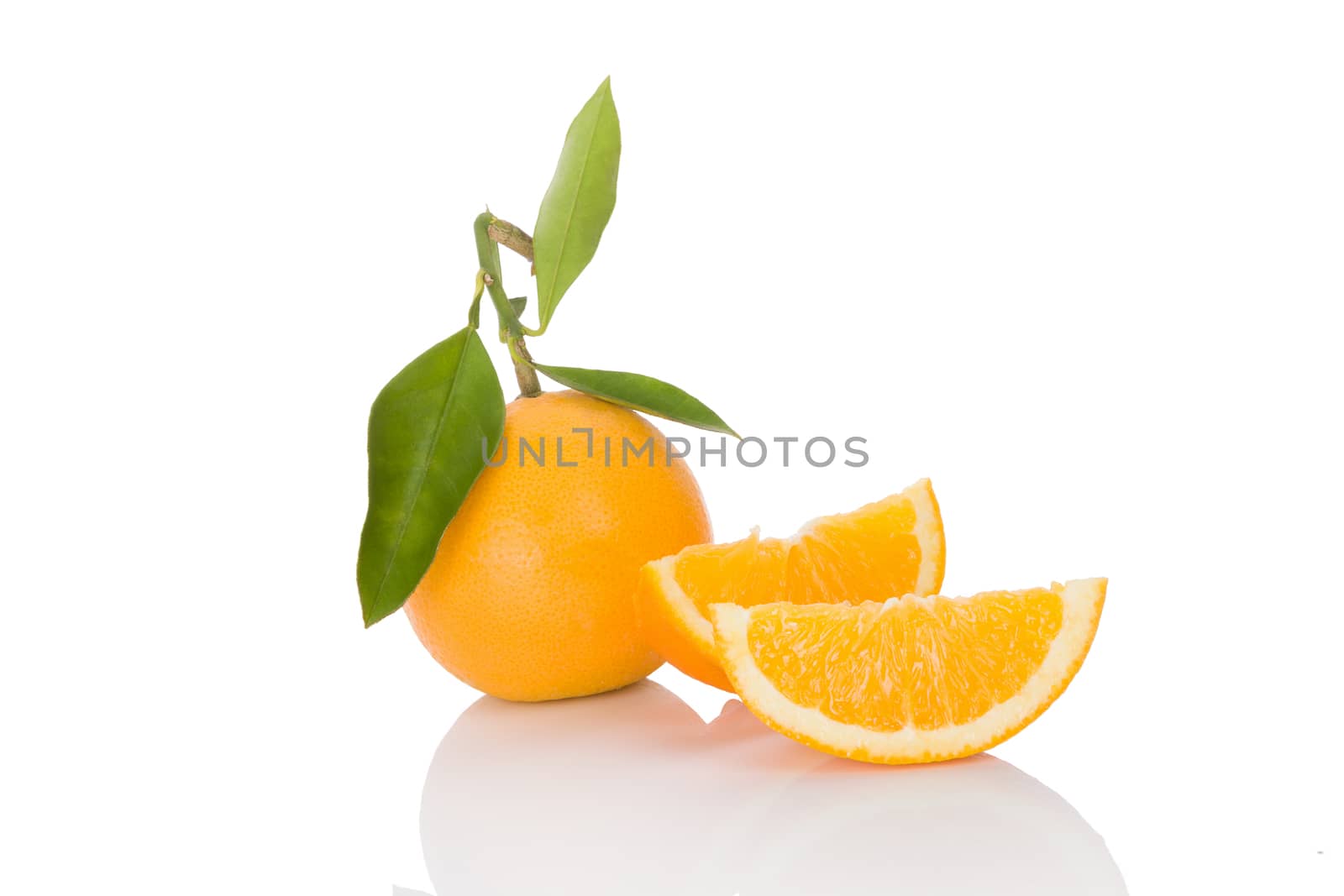 Delicious whole oranges with leaves and slices isolated on white background. Healthy fruit eating. 