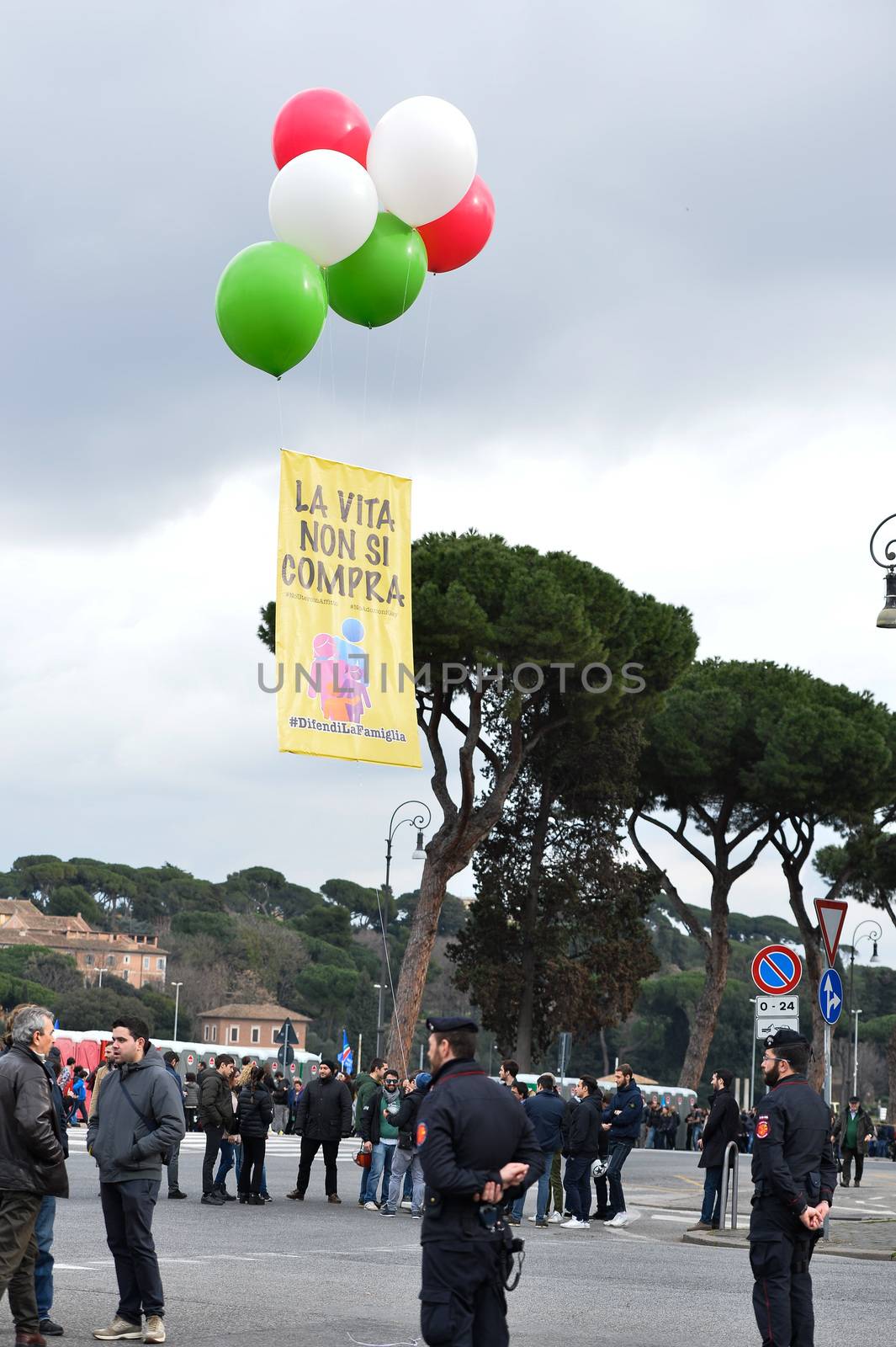 ITALY, Rome: Police stand guard as italians gather in Rome's Circus Maximus arena on January 30, 2016 to protest against a civil unions bill for same-sex couples. The rally's organizers framed the protest as a 'family day' celebration in support of traditional marriage and has been backed by some members of the Catholic church. Lawmakers will vote next week on proposals that will allow gay couples with civil unions, and unmarried heterosexual couples, the same rights as they would have under marriage. Italy is the only nation in Western Europe that does not recognize same sex civil unions or gay marriage. 