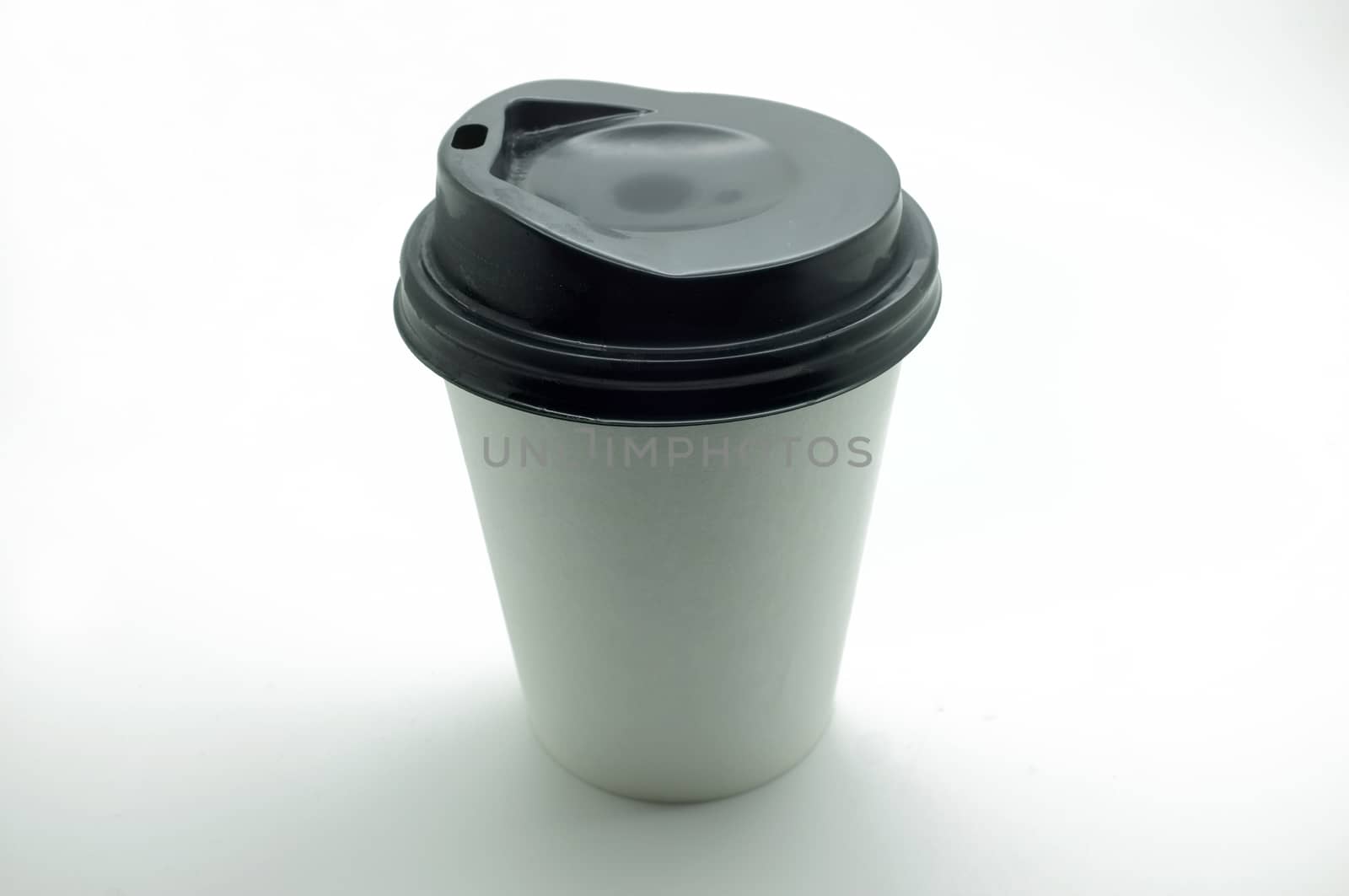 White paper coffee cup with black plastic lid