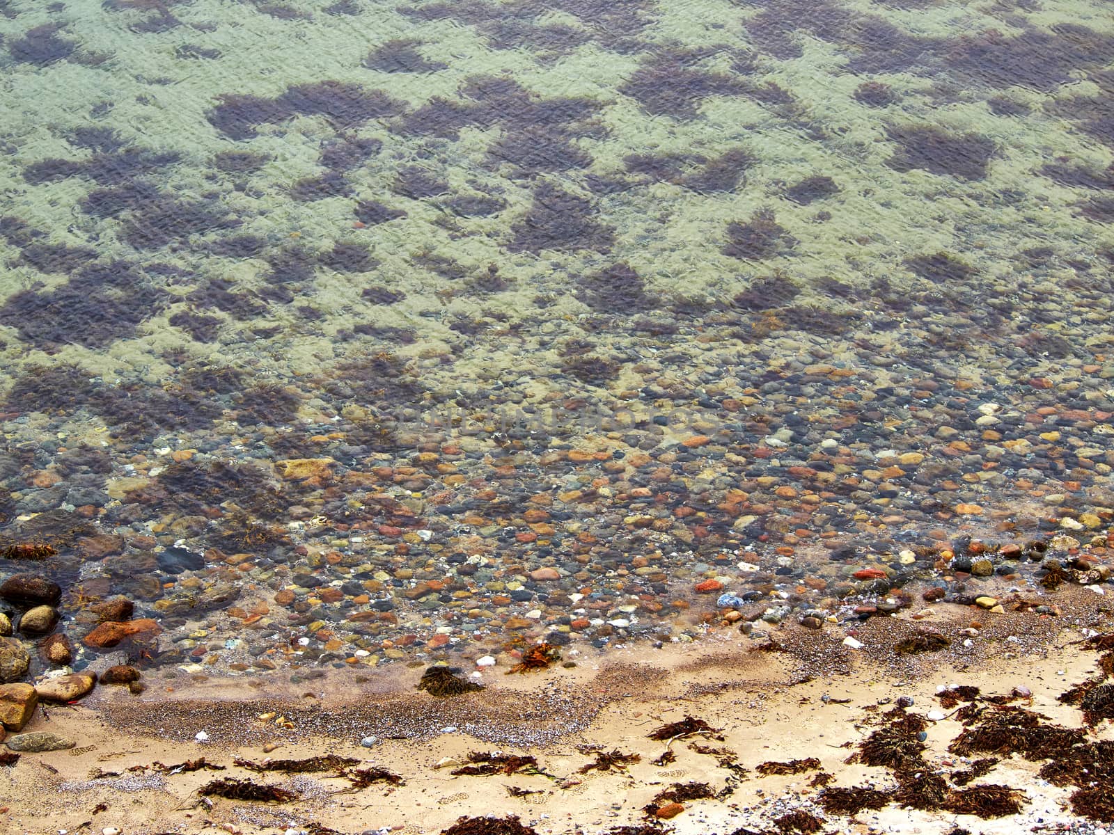 Top view of a beach with rocks in the sea Funen Denmark