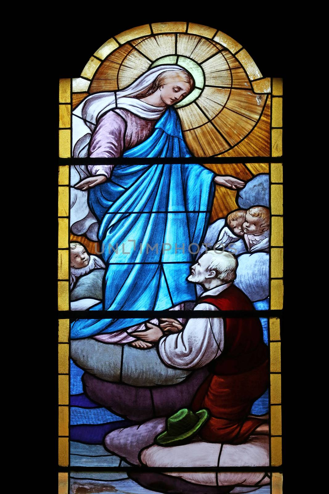 Virgin Mary, stained glass window in the church of Saint Martin, Portofino, Italy