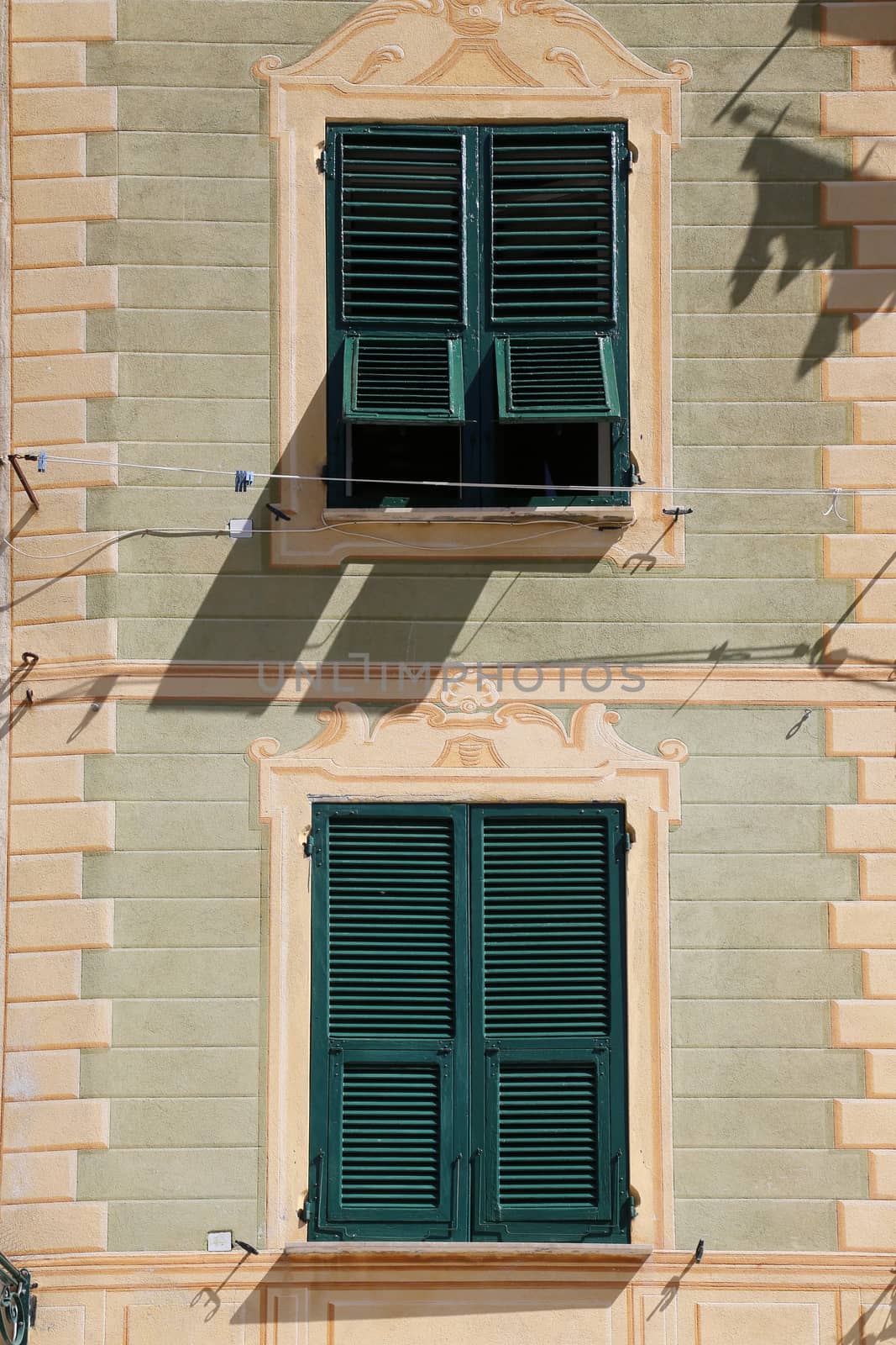 Detail of the colorful pastel houses in sea village of Portofino, Liguria, Italy