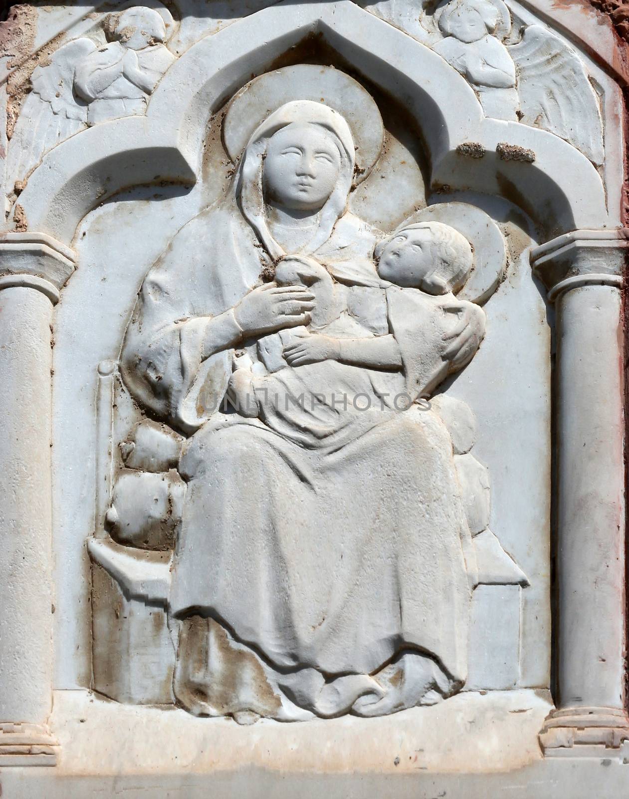 Virgin Mary with Baby Jesus, relief at home in Portofino, Italy