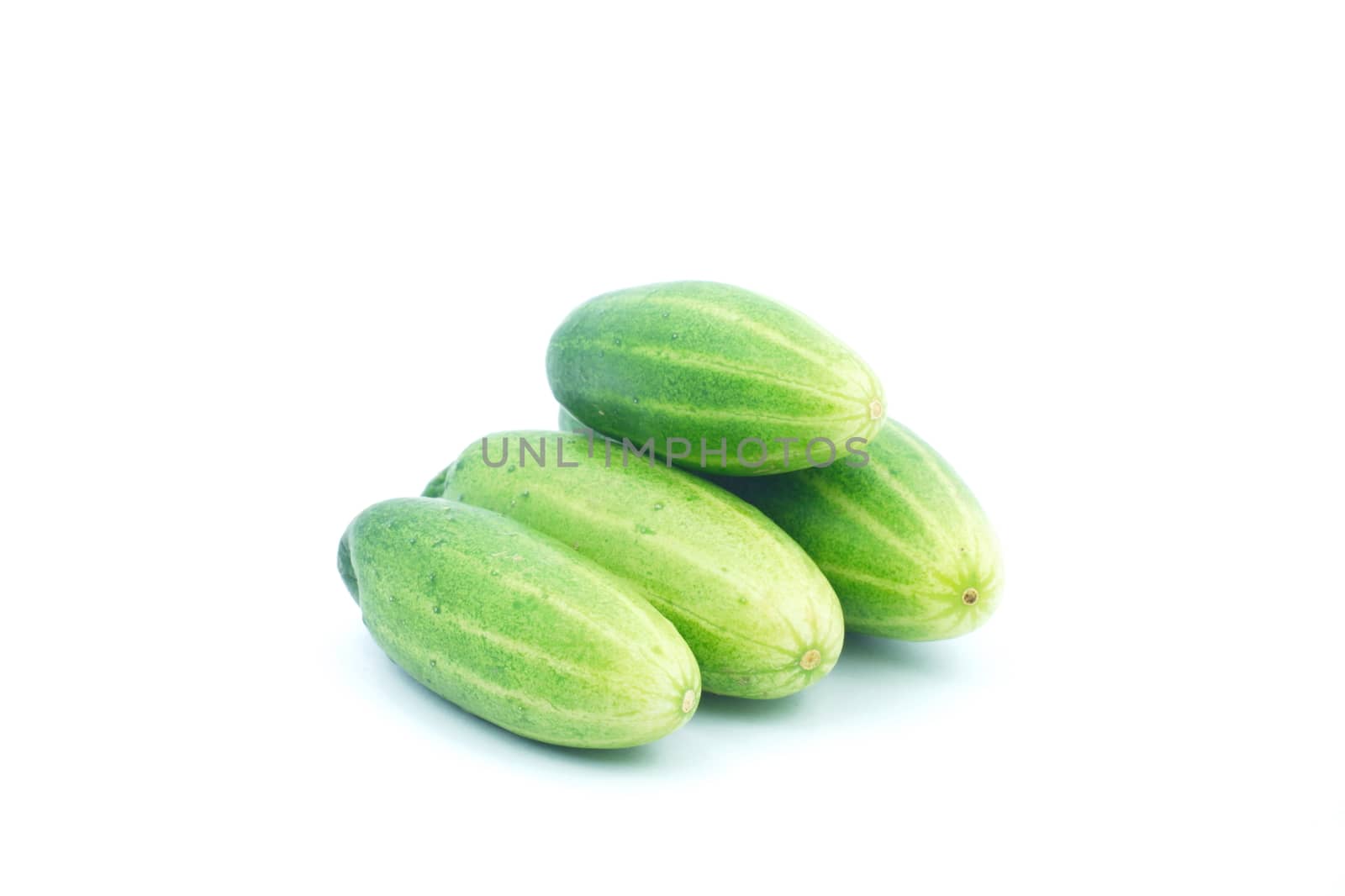 green cucumber on isolate white background by ninelittle