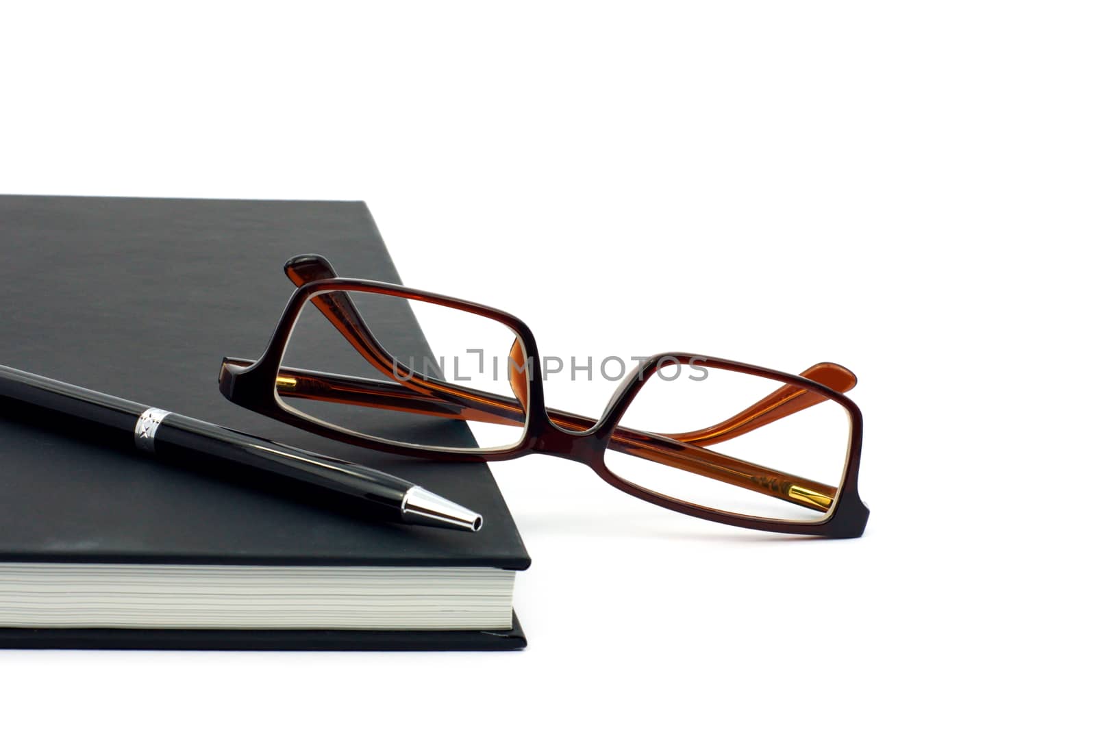 Glasses and black notebook isolate white background by ninelittle
