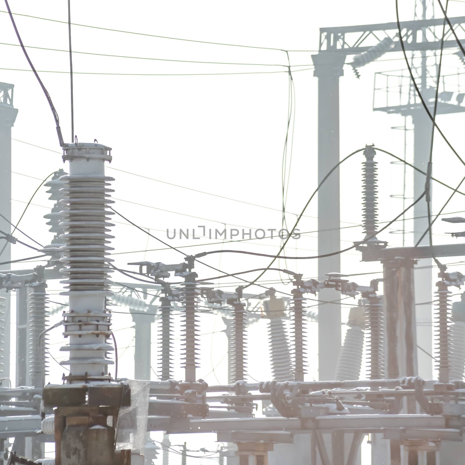 High voltage electric power substation in winter day