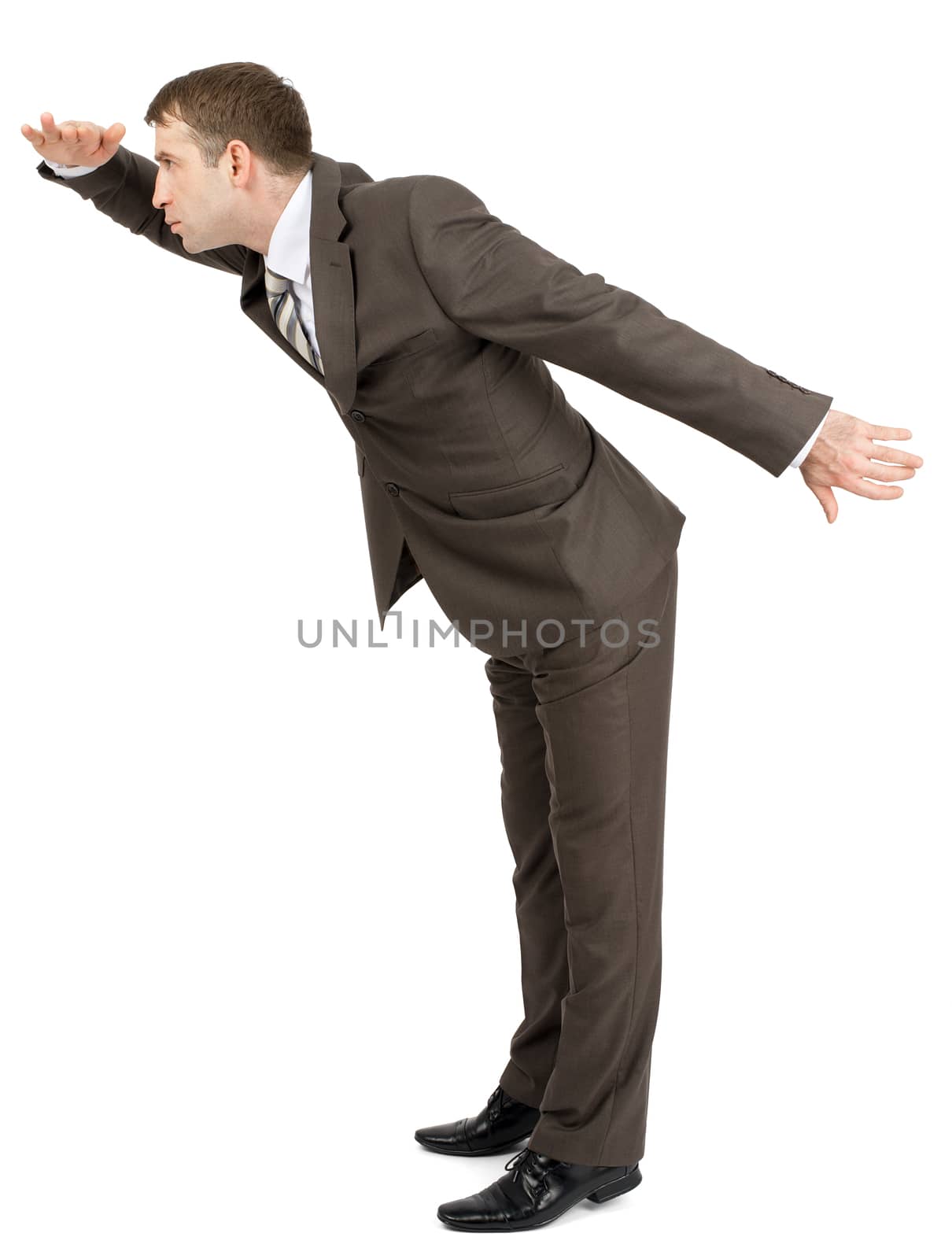 Businessman looking forward isolated on white background, side view