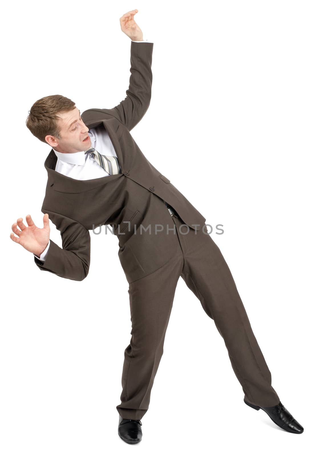 Scared businessman in falling position looking down isolated on white background