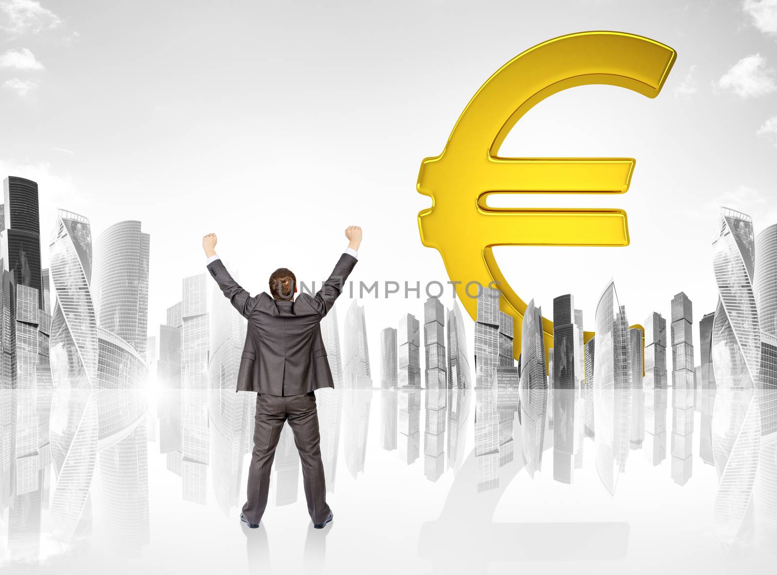 Businessman with spread arms in front of big euro sign