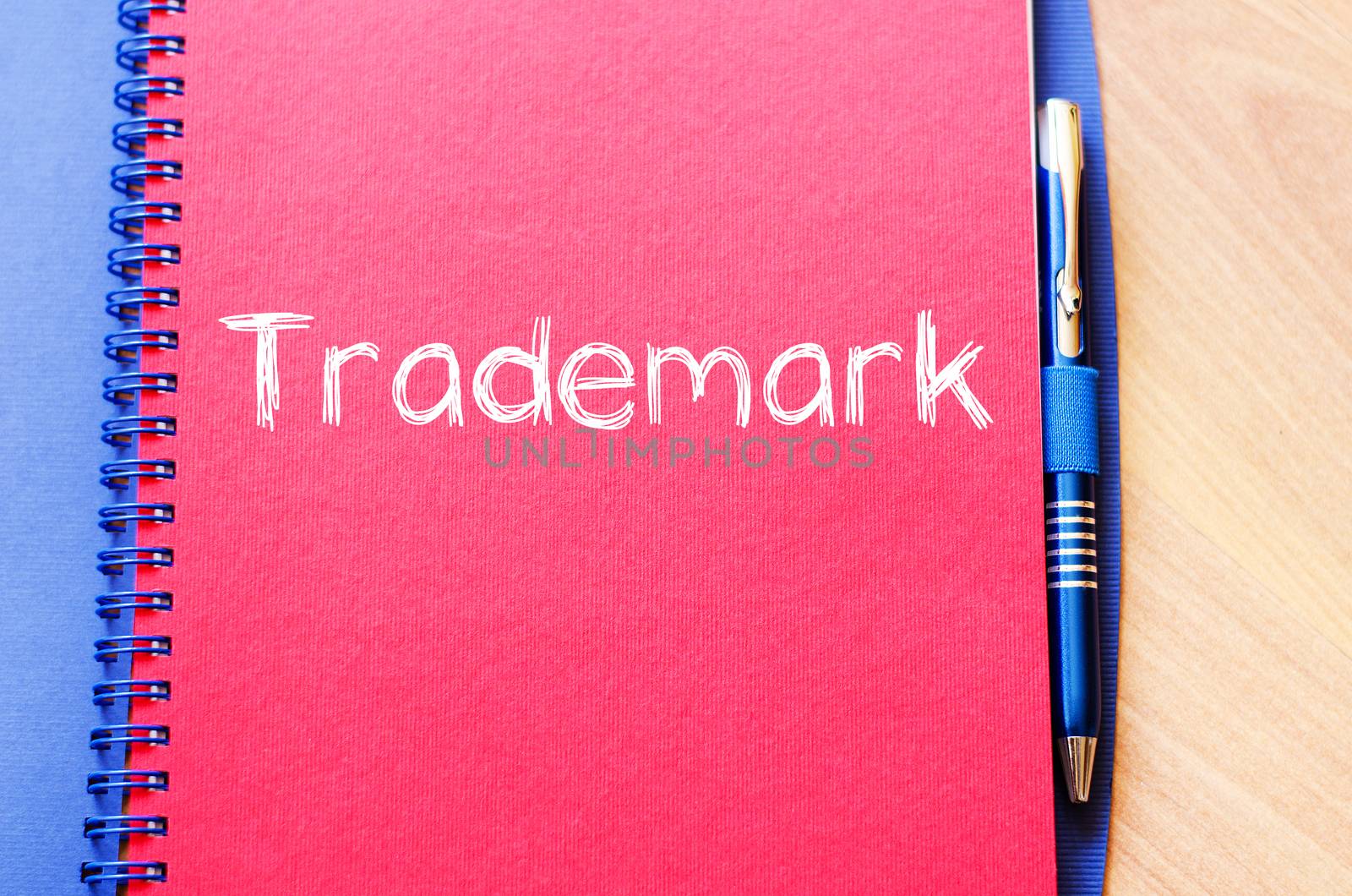 Trademark text concept write on notebook with pen