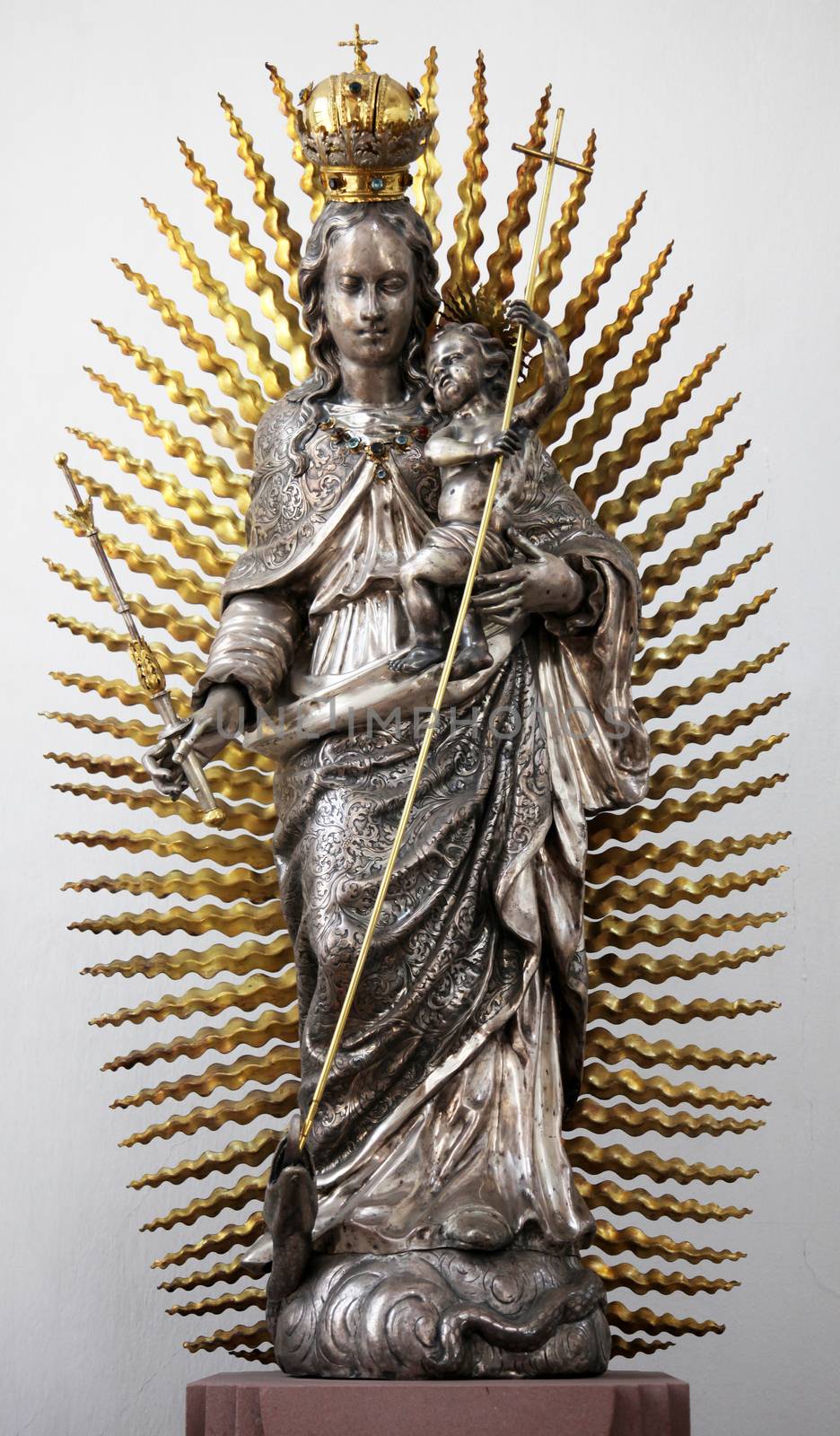 Madonna with child Jesus, statue in the Neumunster Collegiate Church in Wurzburg on July 18, 2013.