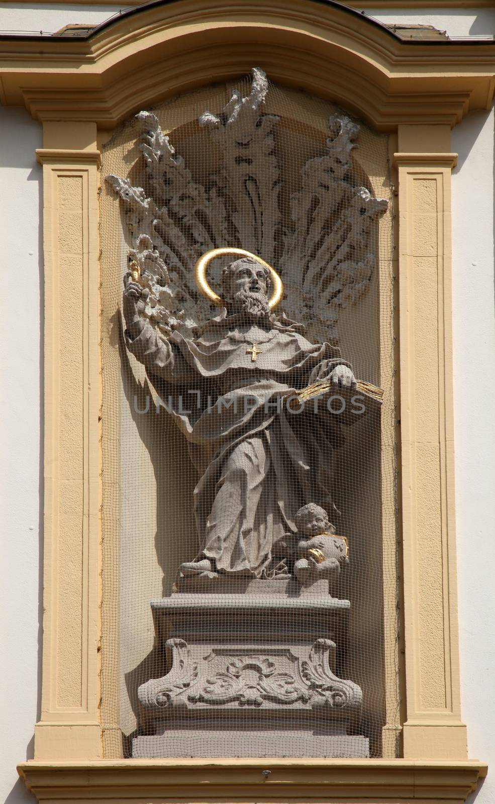 Saint Augustine on the facade of St. Augustine's Church in Wurzburg