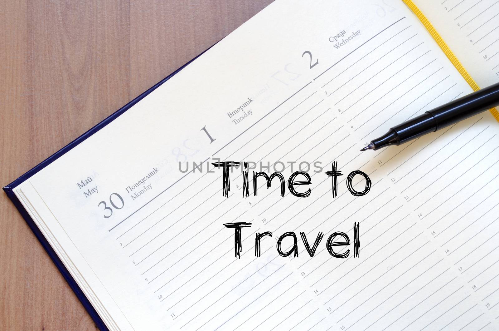 Time to travel text concept write on notebook with pen