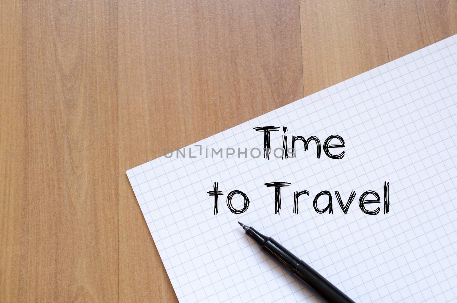 Time to travel text concept write on notebook with pen
