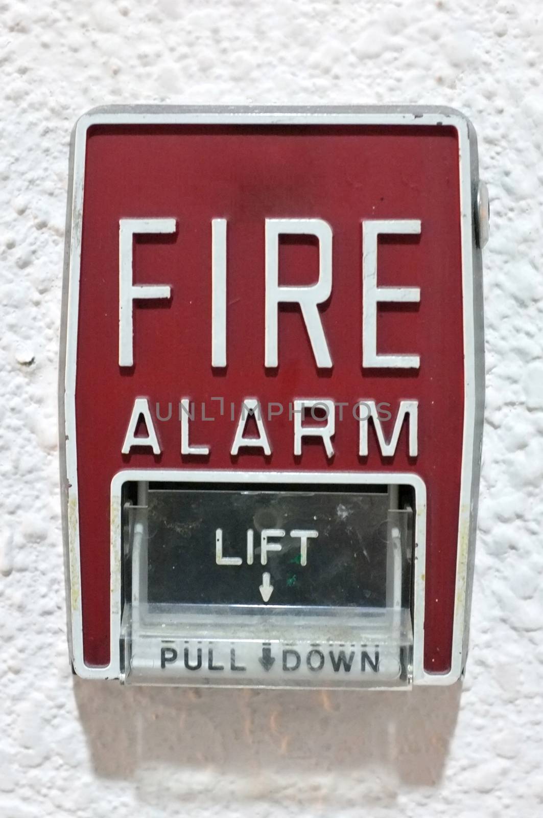 Fire alarm on white wall