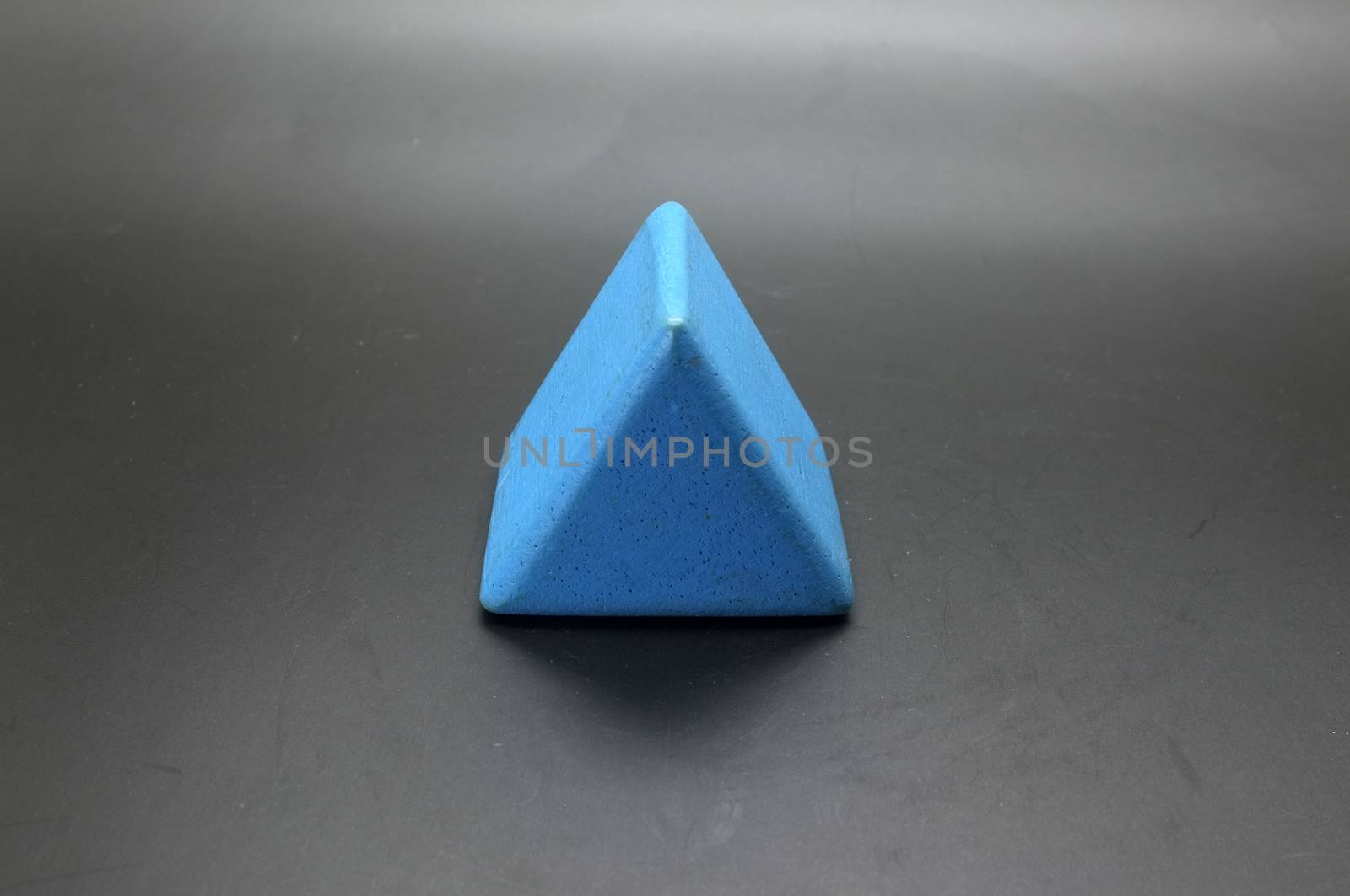 Toy wooden blue triangle blocks by Hepjam