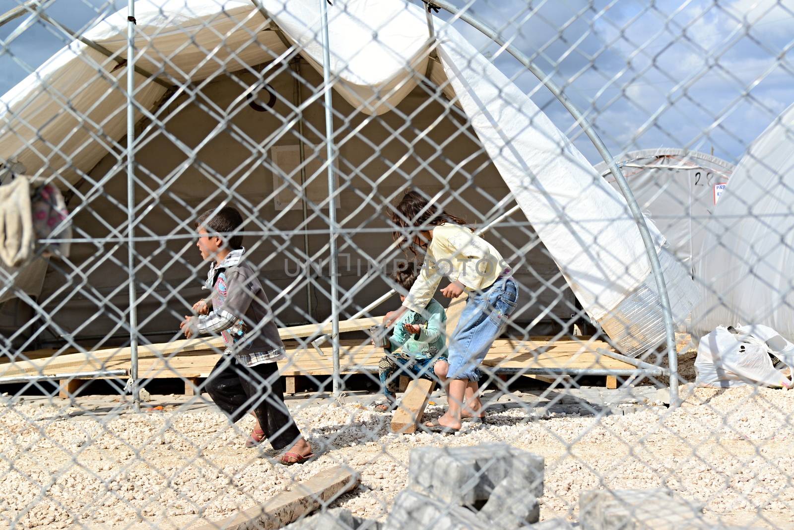 Unnamed  syrian (kurdish) people in refugee camp in Suruc. These people are refugees from Kobane and escaped because of Islamic state attack. March 30, 2015; Suruc, Turkey
