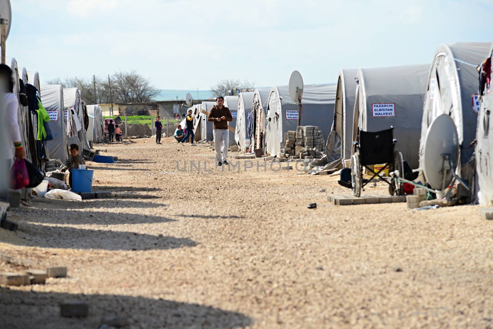 Unnamed  syrian (kurdish) people in refugee camp in Suruc. These people are refugees from Kobane and escaped because of Islamic state attack. March 30, 2015; Suruc, Turkey