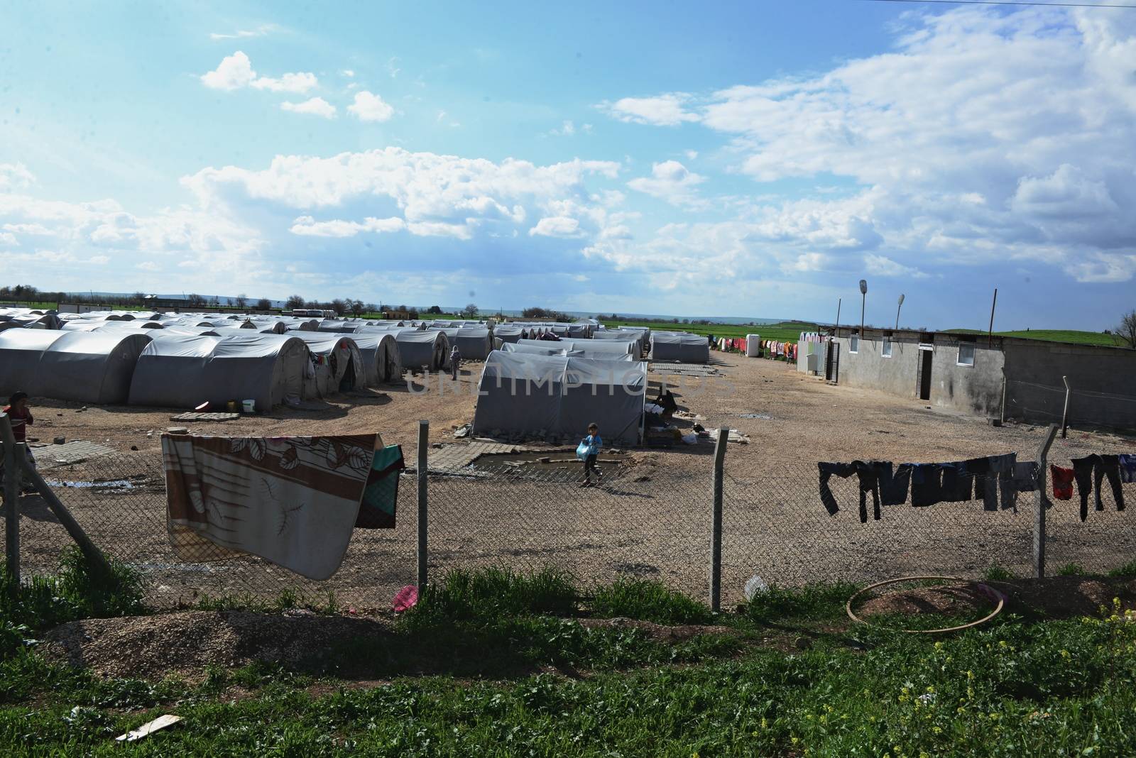 Unnamed  syrian (kurdish) people in refugee camp in Suruc. These people are refugees from Kobane and escaped because of Islamic state attack. March 30, 2015; Suruc, Turkey