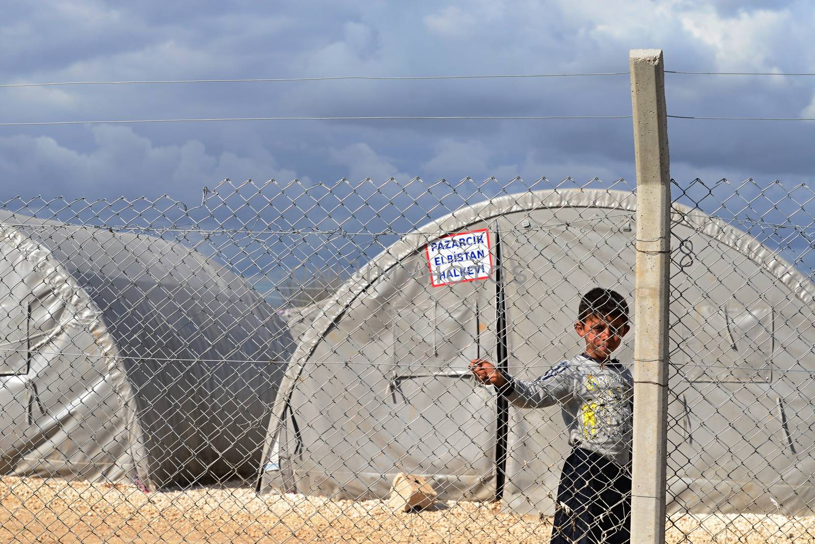 Syrian people in refugee camp in Suruc. These people are refugees from Kobane and escaped because of Islamic state attack. 30.3.2015, Suruc, Turkey