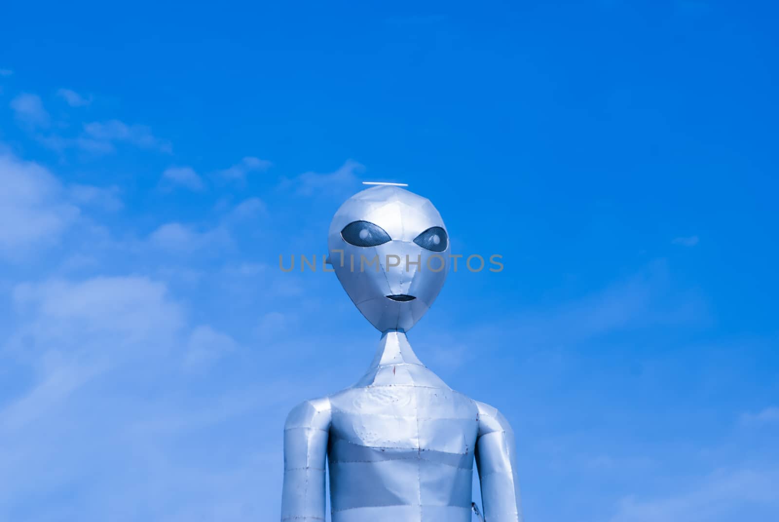 Alien on blue sky by emattil