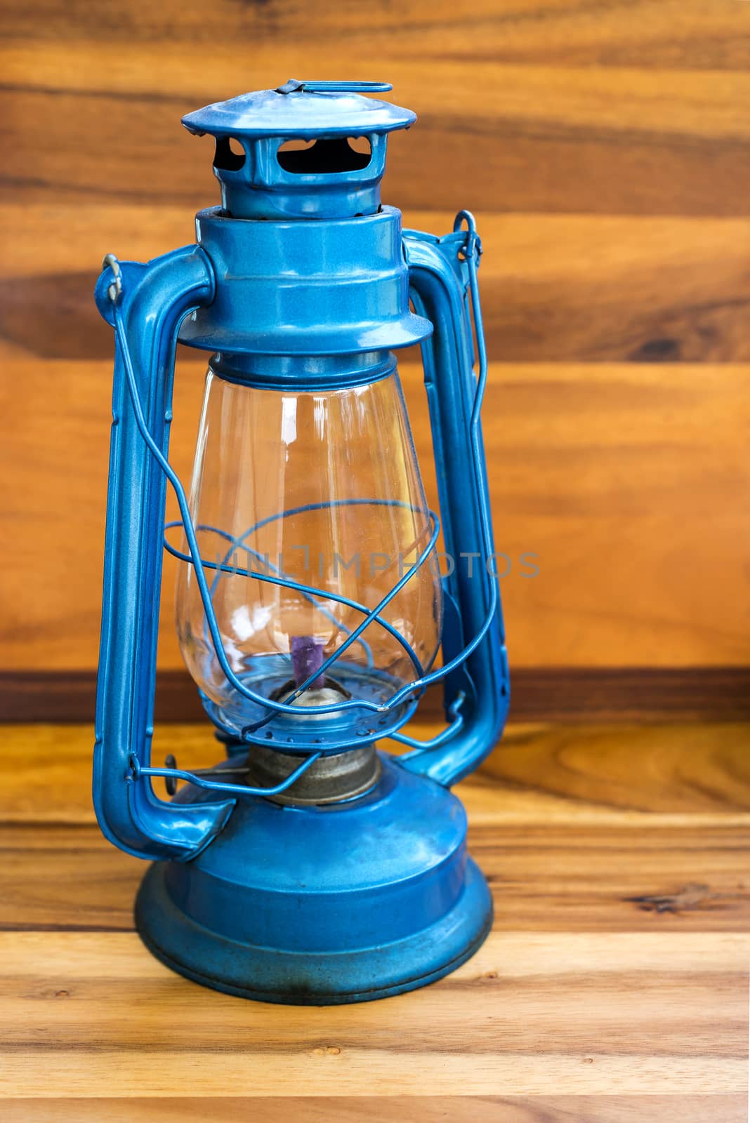 Old Lamp on the wooden background