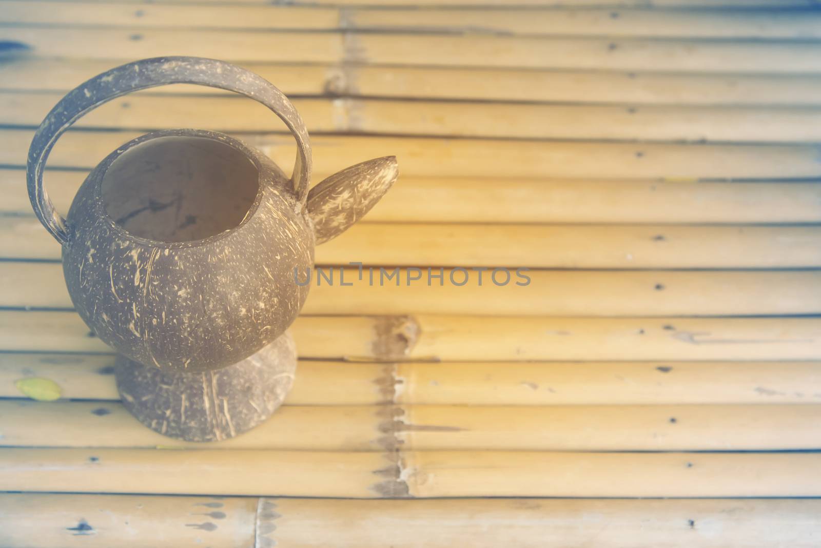 Traditional Kettle in thailand on wood table add retro color