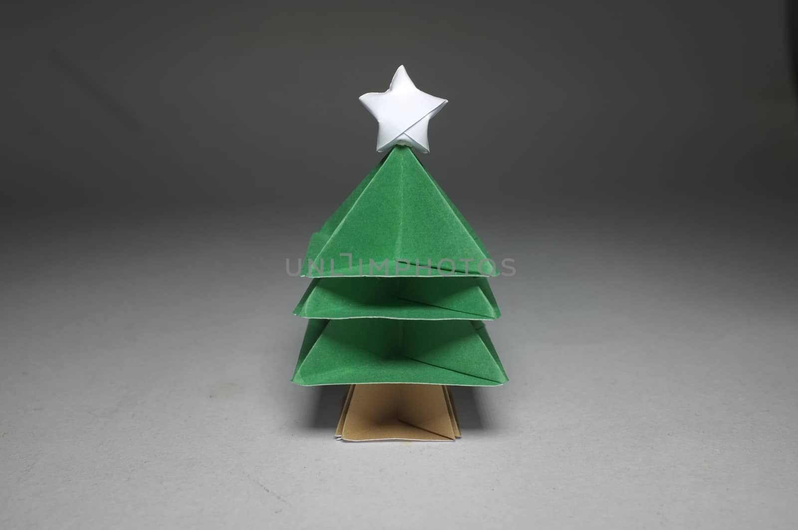 Origami in shape of Christmas Tree with star on top