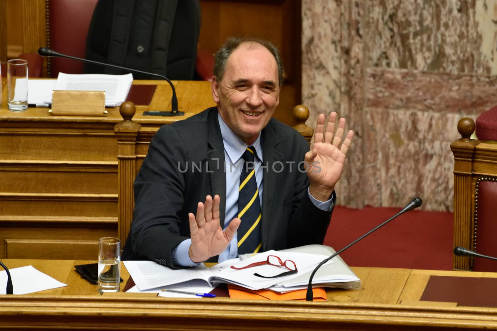 GREECE, Athens : Greece's Economy Minister Giorgos Stathakis attends a parliamentary session ahead of a voting, in Athens, Greece December 15, 2015. Greek parliament votes on reforms needed for the country to receive further financial aid from its international lenders.