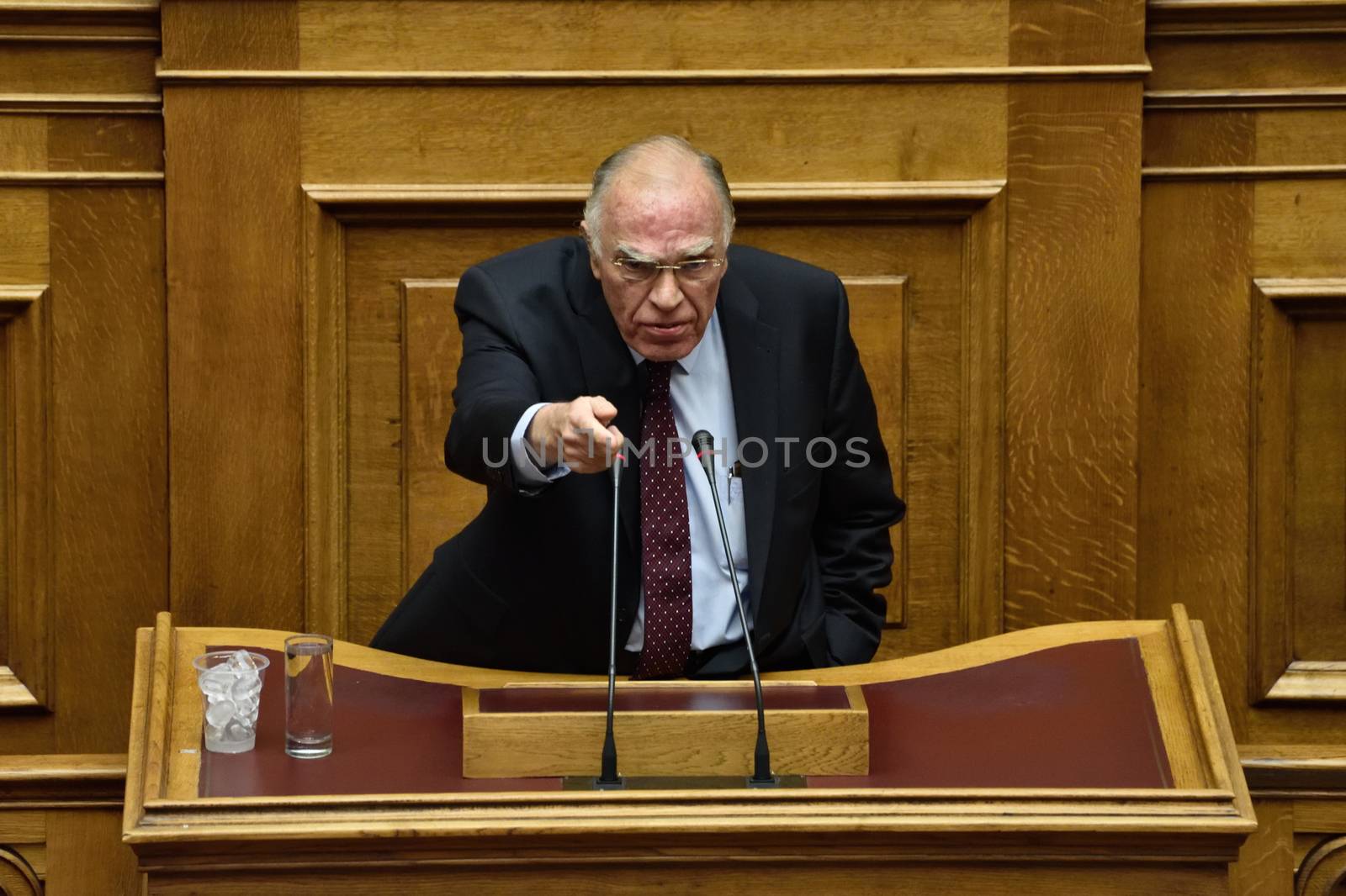 GREECE, Athens : Vassilis Leventis leader of the Union of Centrists addresses the MPs during a parliamentary session ahead of a voting, in Athens, Greece December 15, 2015. Greek parliament votes on reforms needed for the country to receive further financial aid from its international lenders. 