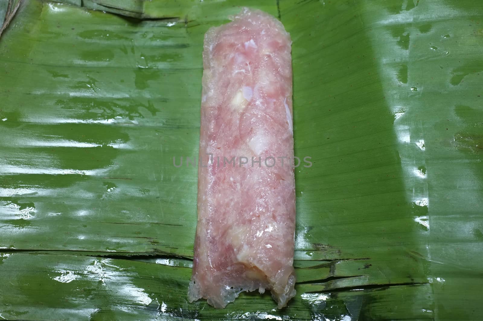 Sour pork in banana leaf package, Thai food