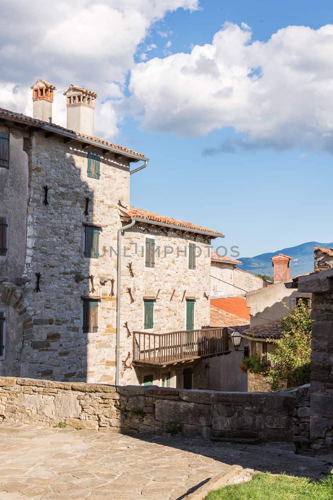 stone buildings in the old town by vlaru