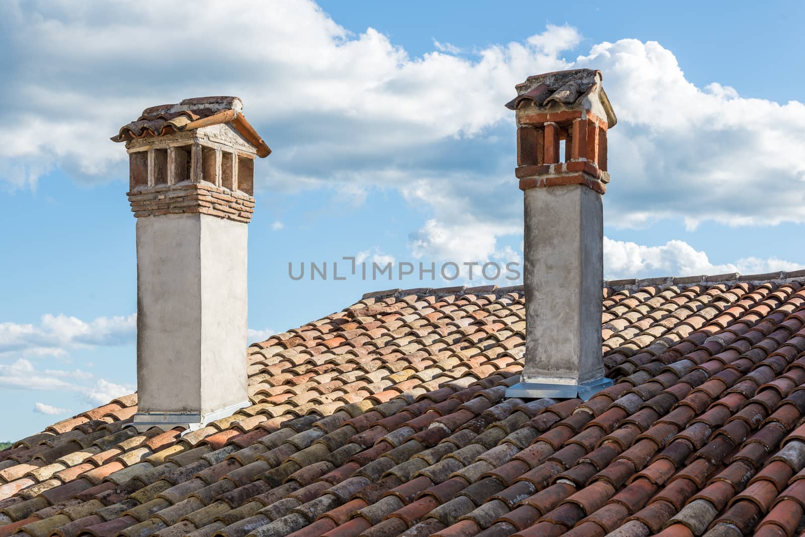 ancient tiled roof in the old town by vlaru