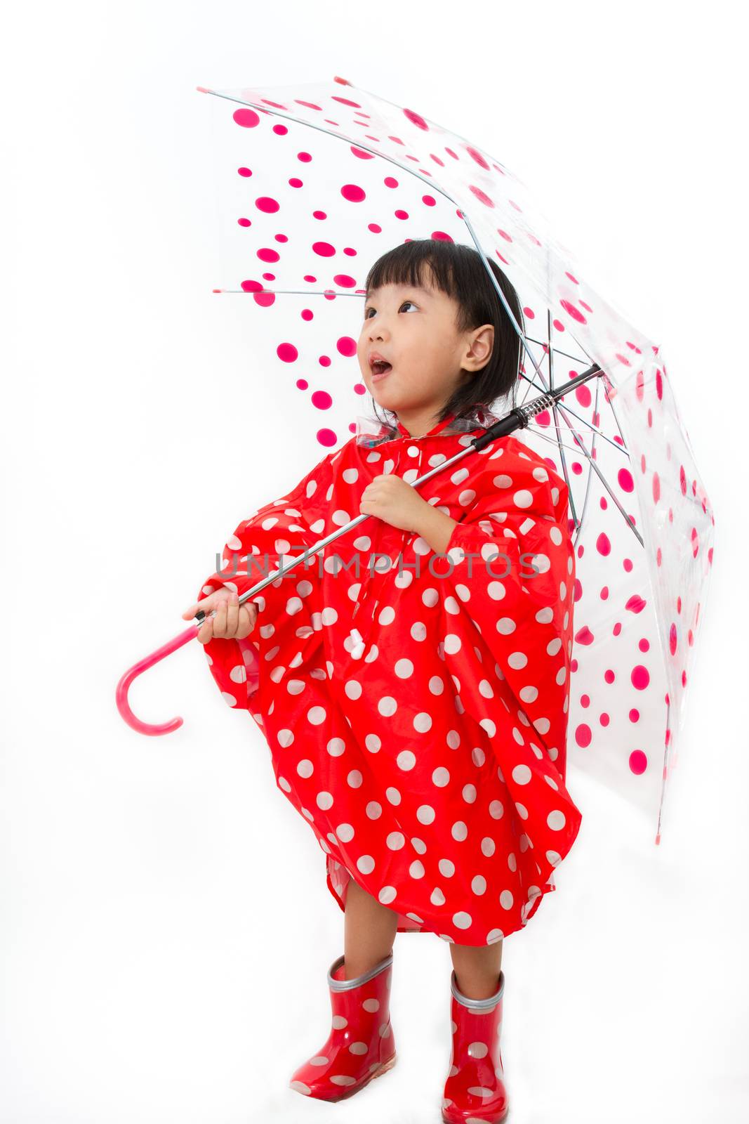 Chinese Little Girl Holding umbrella with raincoat by kiankhoon