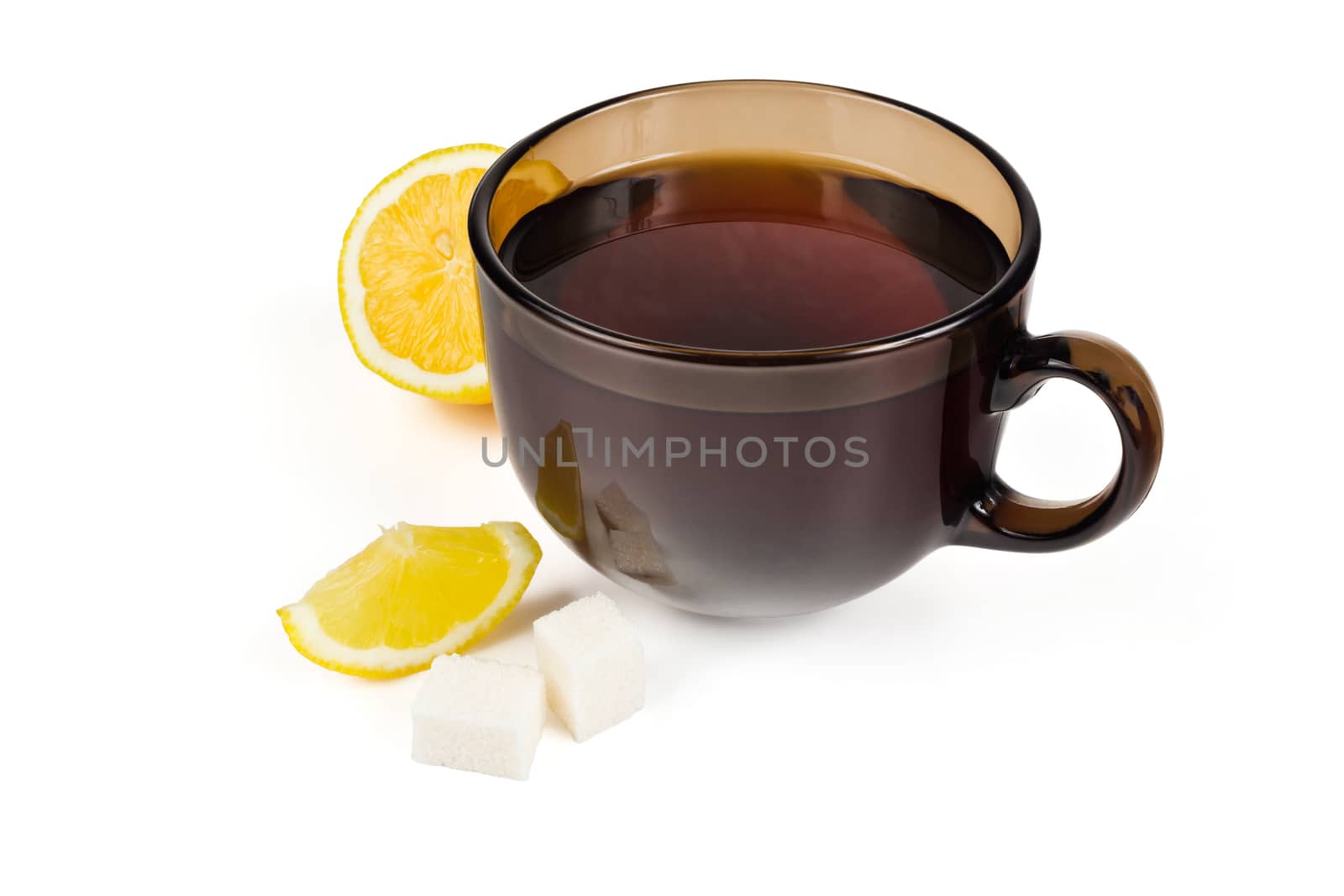 Cup of tea lemon slice and sugar on a white background