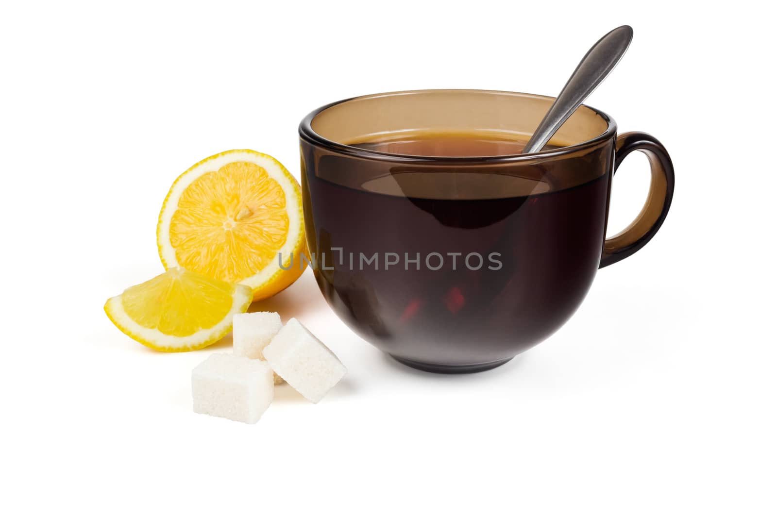 Cup of tea lemon slice and sugar on a white background