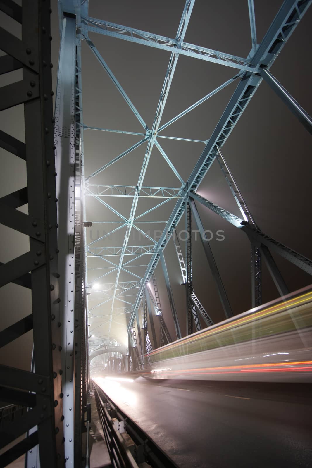 Night traffic on a beautiful modern bridge