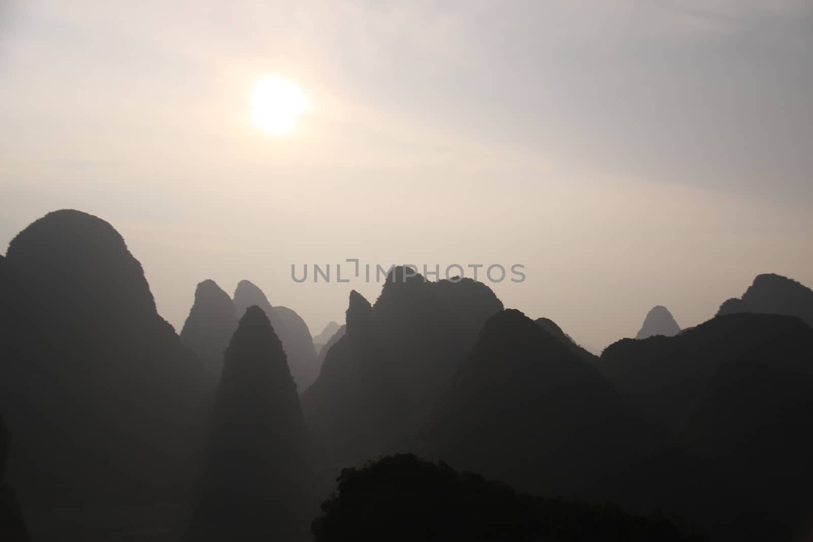 Amaizing Yangshuo valley in China from a hot air balloon at sunset