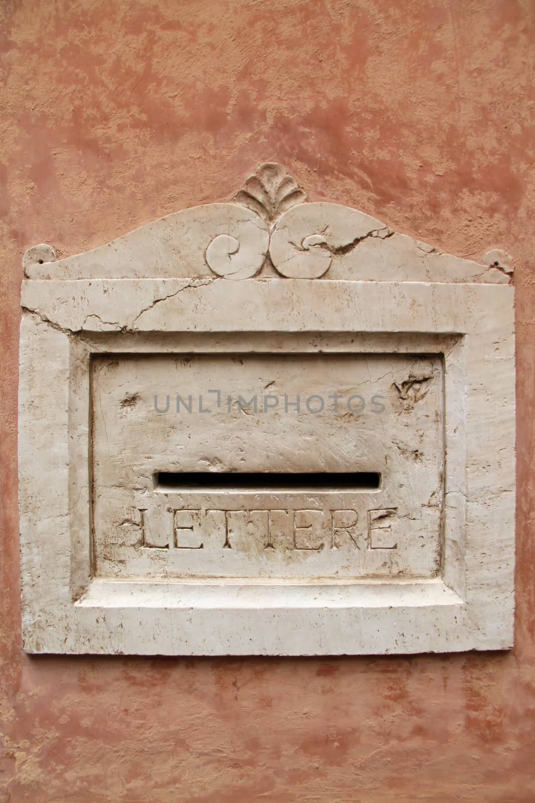 Decorative marble mailbox in the Italian town of Bergamo