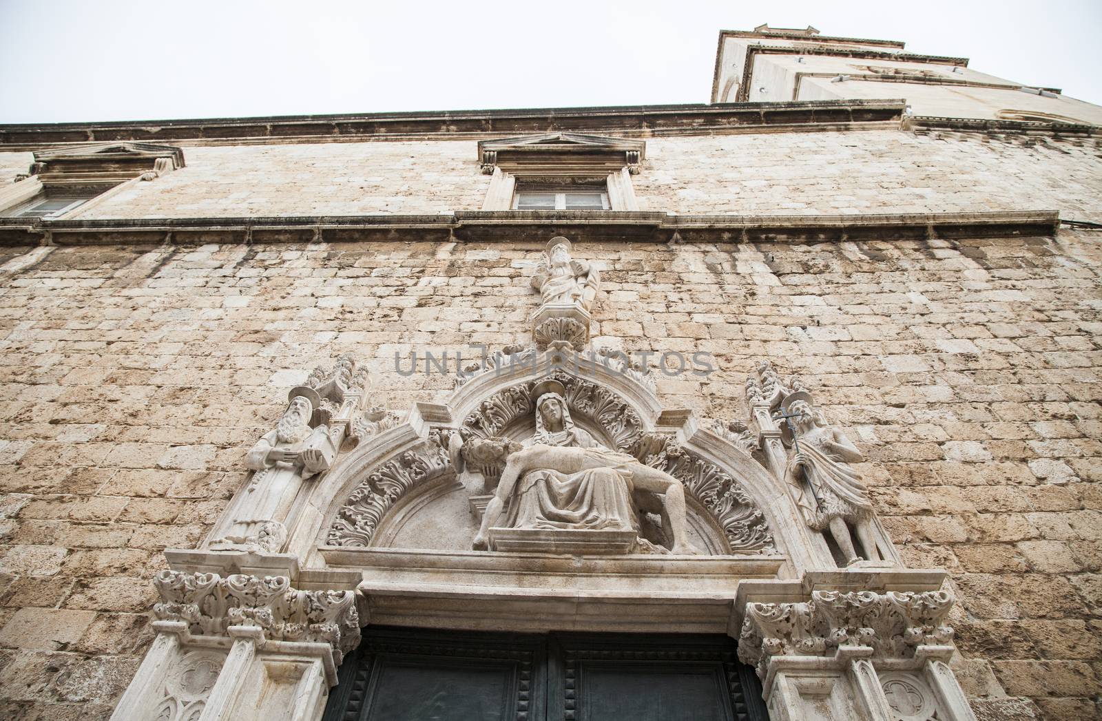 Detail above the doors on Sponza's palace in Dubrovnik. 
