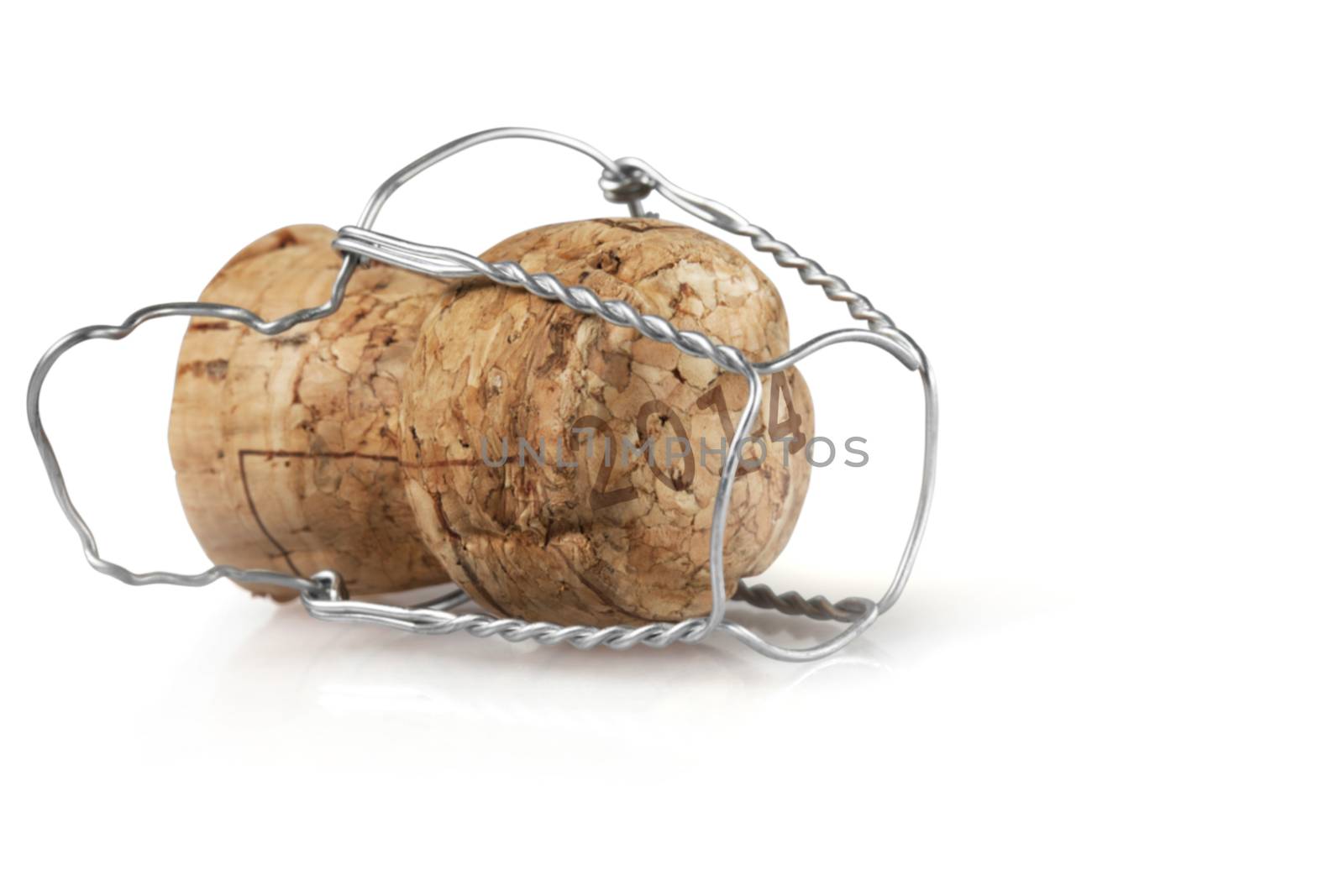 Close-up of champagne cork isolated over white background